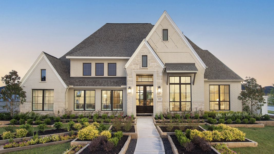 Front exterior of a home in the Valencia 70' community, located in Manvel, TX (Image 1). Front exterior of a home in the Valencia 70' community, located in Manvel, TX (Image 1).