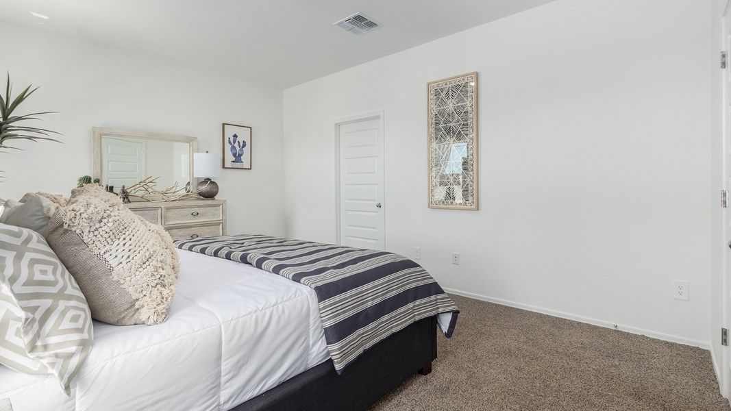 Furnished interior in a model home at Casas del Cerrito in Tucson (Image 24).