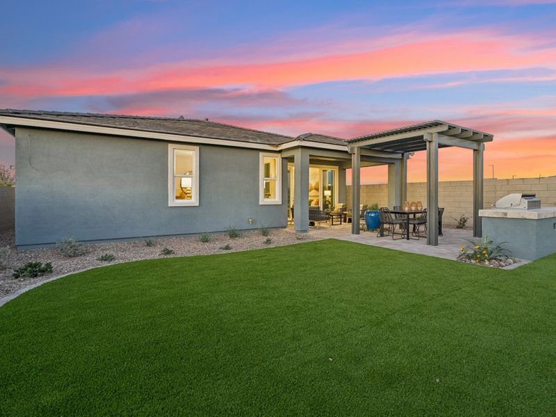 A house with a grass yard. A house with a grass yard.