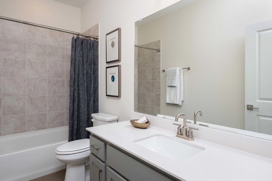 Furnished interior in a model home at The Farm in Allen (Image 14).