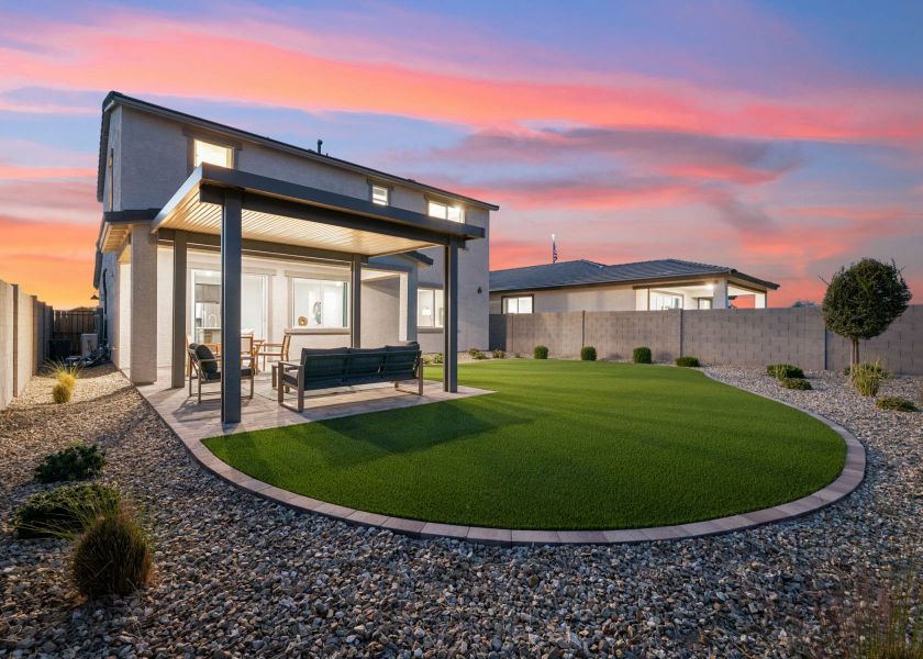 A building with a large lawn.