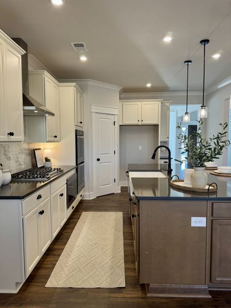 Furnished interior in a model home at Springside Reserve in Powder Springs (Image 49).