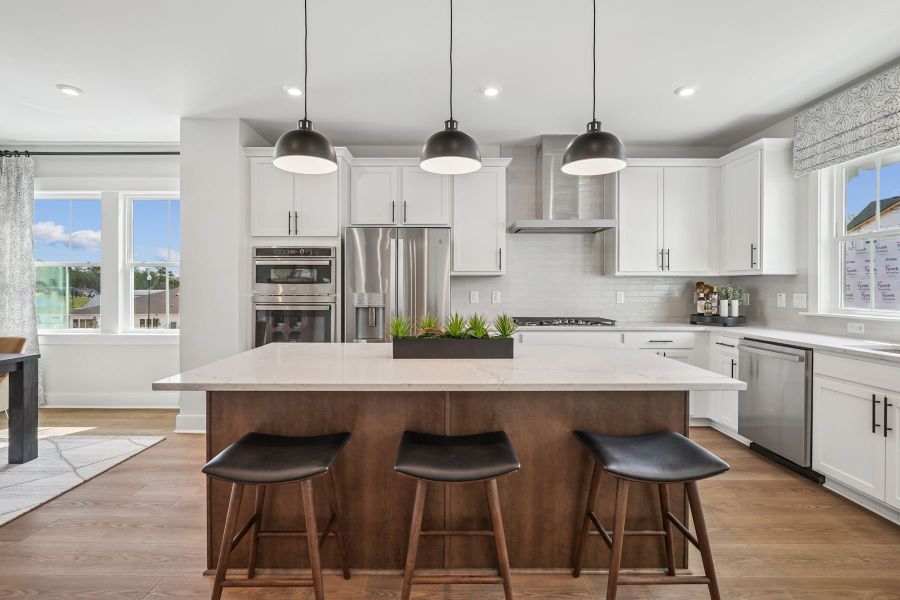 Furnished interior in a model home at Mews at Holding Village in Wake Forest (Image 4).