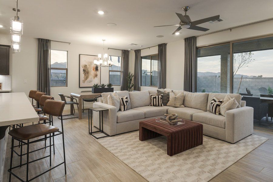 Furnished interior in a model home at Windrose V in Waddell (Image 32).