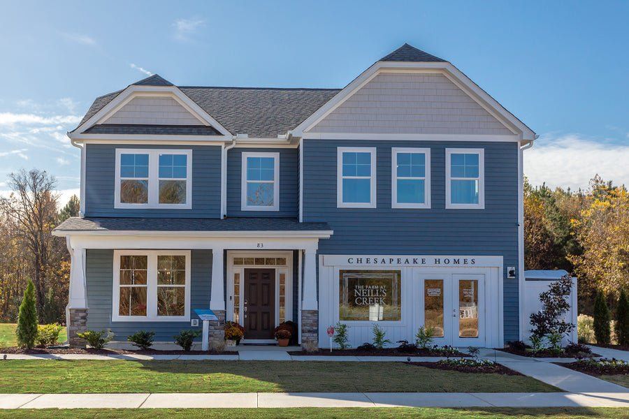 Front exterior of a home in the The Farm at Neill's Creek community, located in Lillington, NC (Image 2).