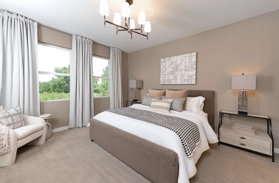 Furnished interior in a model home at Tyson Reserve in St. Cloud (Image 10).