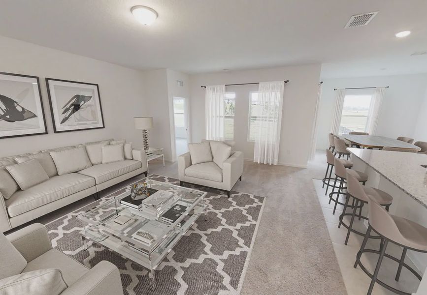 Furnished interior in a model home at Sunset Hills in Winter Haven (Image 5).