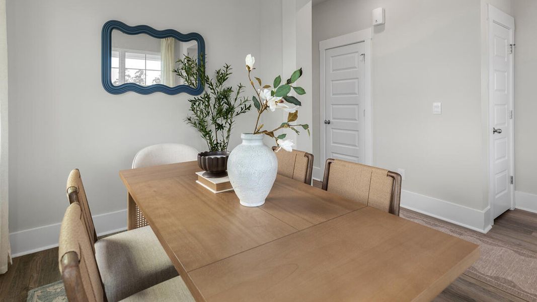 Furnished interior in a model home at The Palms at Indigo Preserve Townhomes in Leland (Image 8).