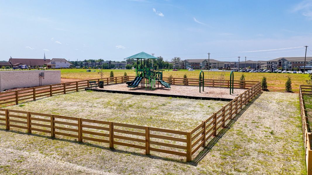 On-site Community Playground and Swing Set with grass area On-site Community Playground and Swing Set with grass area
