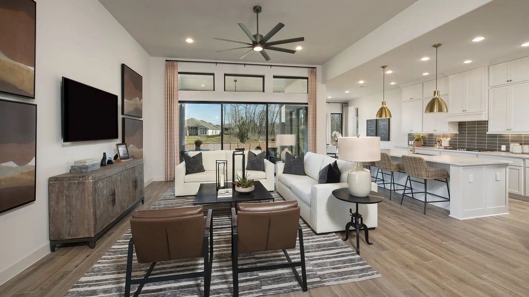 Furnished interior in a model home at Lakes Of Cane Island 60' in Katy (Image 12).