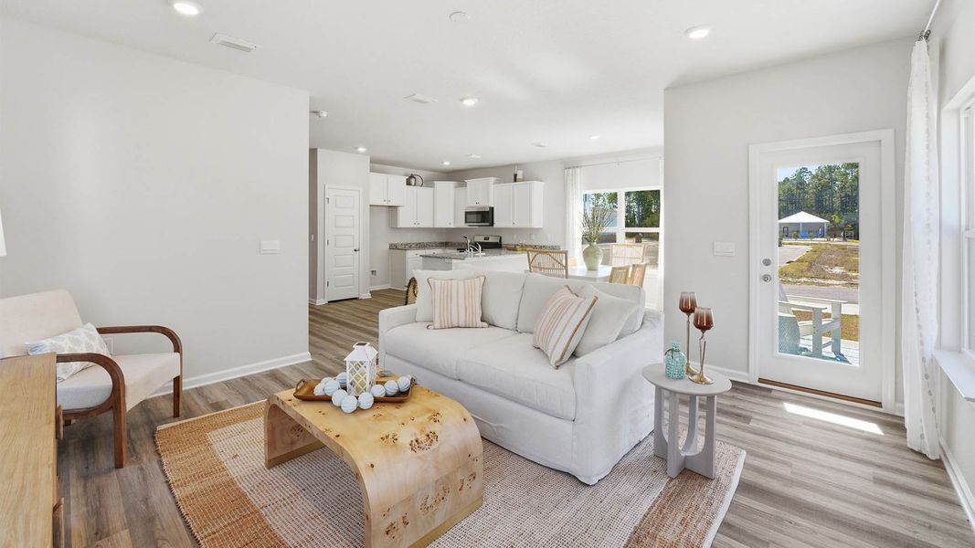 Furnished interior in a model home at Chateau Nemours in Port Saint Joe (Image 7).