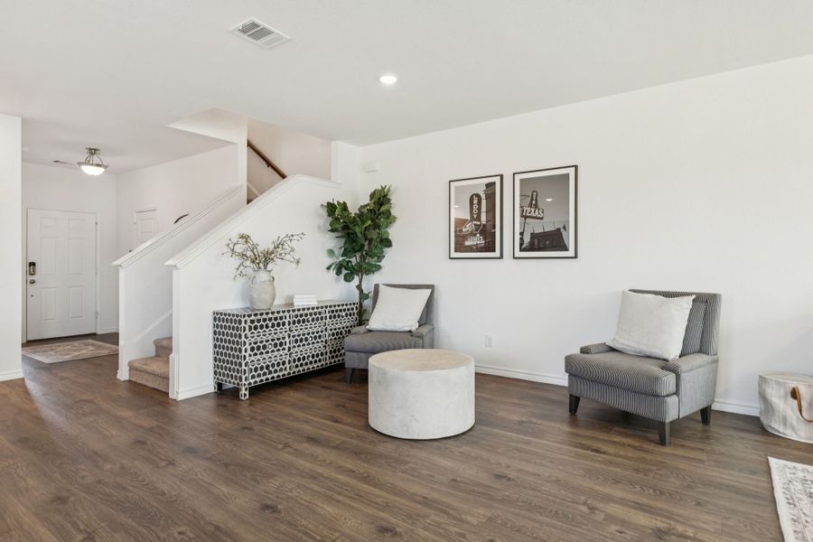 Furnished interior in a model home at Eagle Cove in Denton (Image 19).
