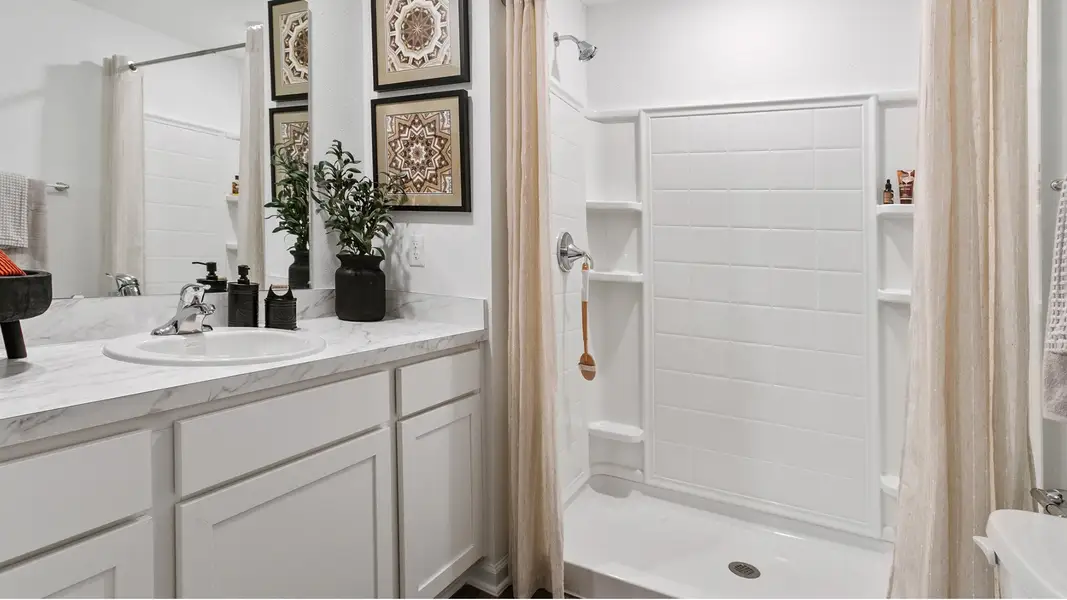 Furnished interior in a model home at Cordera Townhomes Express in St. Augustine (Image 11).