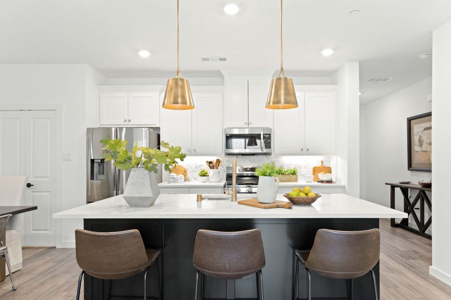 Furnished interior in a model home at Woodbridge Townhomes in Wylie (Image 28).