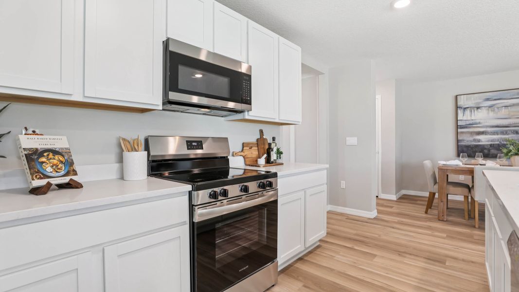 Furnished interior in a model home at Triumph South in Wildwood (Image 5). Furnished interior in a model home at Triumph South in Wildwood (Image 5).