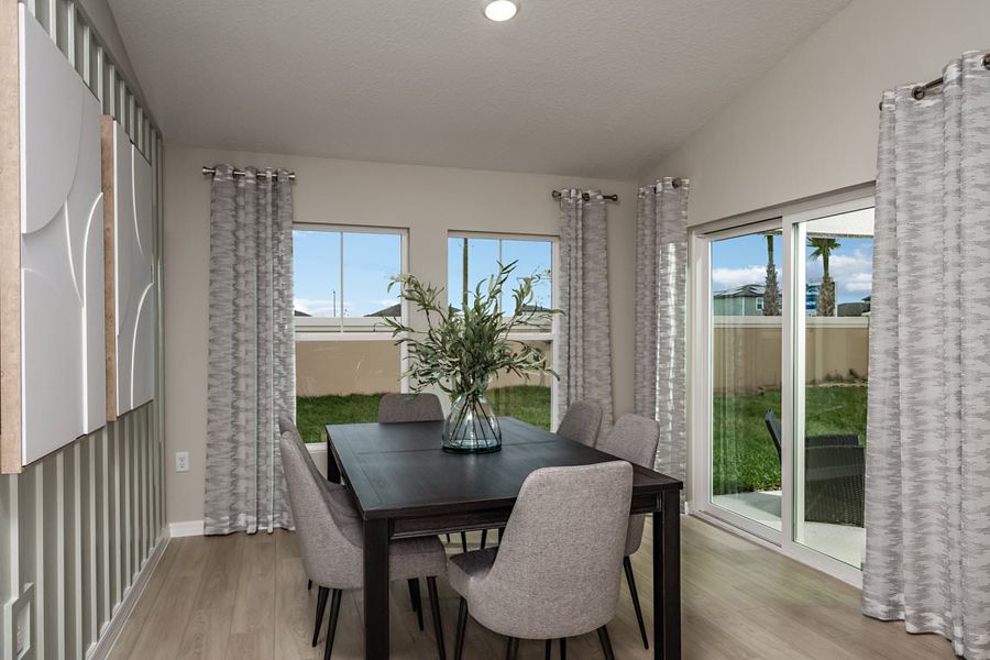 Furnished interior in a model home at Lawson Dunes in Haines City (Image 8).