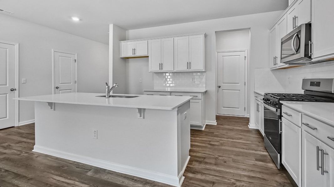 Furnished interior in a model home at The Townes Park in Apex (Image 24). Furnished interior in a model home at The Townes Park in Apex (Image 24).