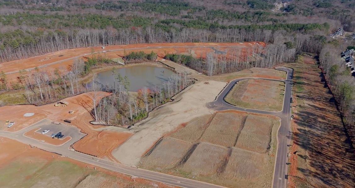 A large dam with a body of water in the middle. A large dam with a body of water in the middle.
