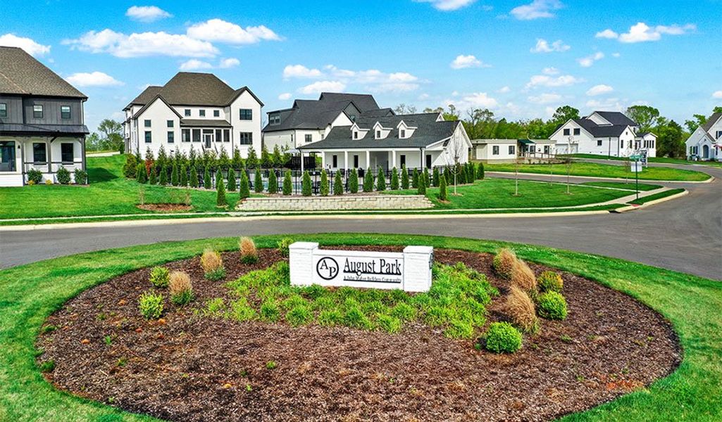 Entrance to the August Park community in Spring Hill, TN, featuring signage and landscaping (Image 1).