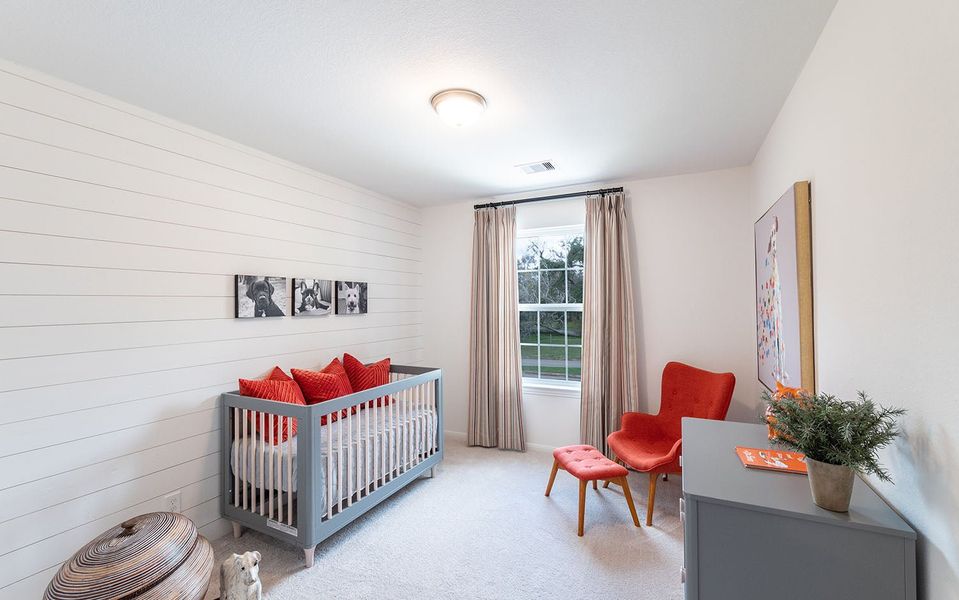 Furnished interior in a model home at Infinity Square in Kyle (Image 8).