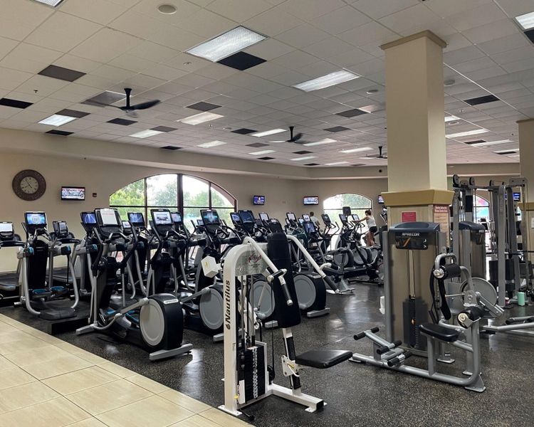 A gym with exercise equipment.
