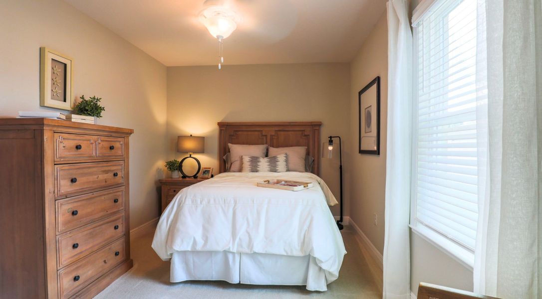 Furnished interior in a model home at South Gulf Cove in Port Charlotte (Image 2).