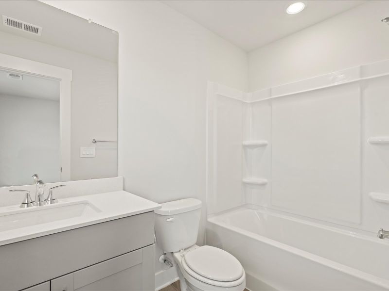 Furnished interior in a model home at Reserve at Arden Woods in Greenville (Image 3).