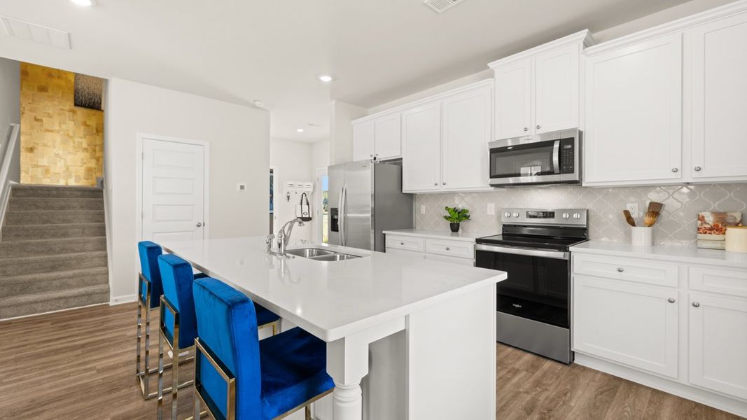 Furnished interior in a model home at Brookland Commons in Monroe (Image 6).