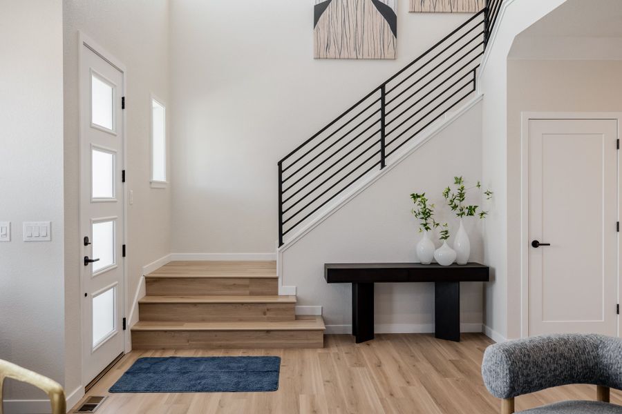Furnished interior in a model home at Arras Park in Thornton (Image 12).