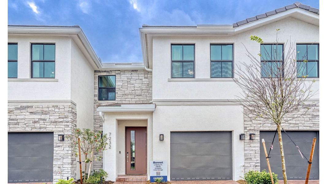 Front exterior of a home in the Vineyards community, located in Davie, FL (Image 8).