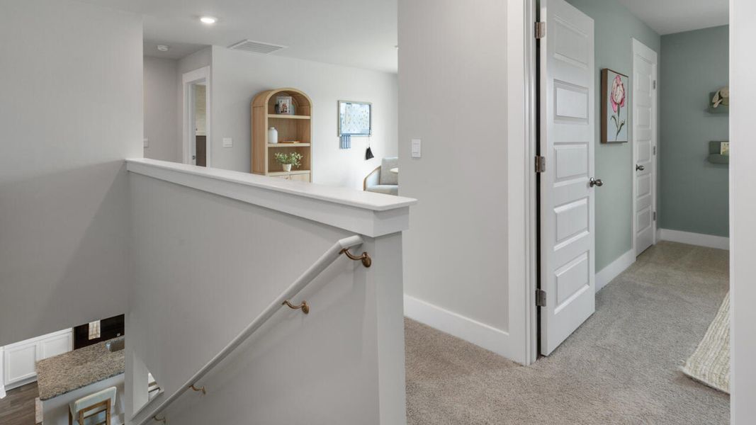 Furnished interior in a model home at Eagle Creek in Bolivia (Image 24).