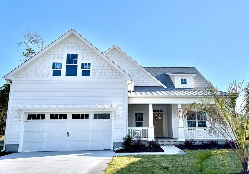 Front exterior of a home in the The Sanctuary at Sunset Beach community, located in Sunset Beach, NC (Image 13).