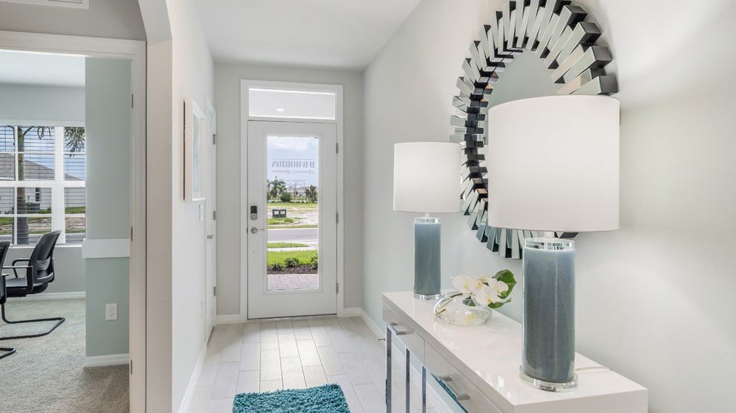 Furnished interior in a model home at Cape Coral Water & Sewer in Cape Coral (Image 29).