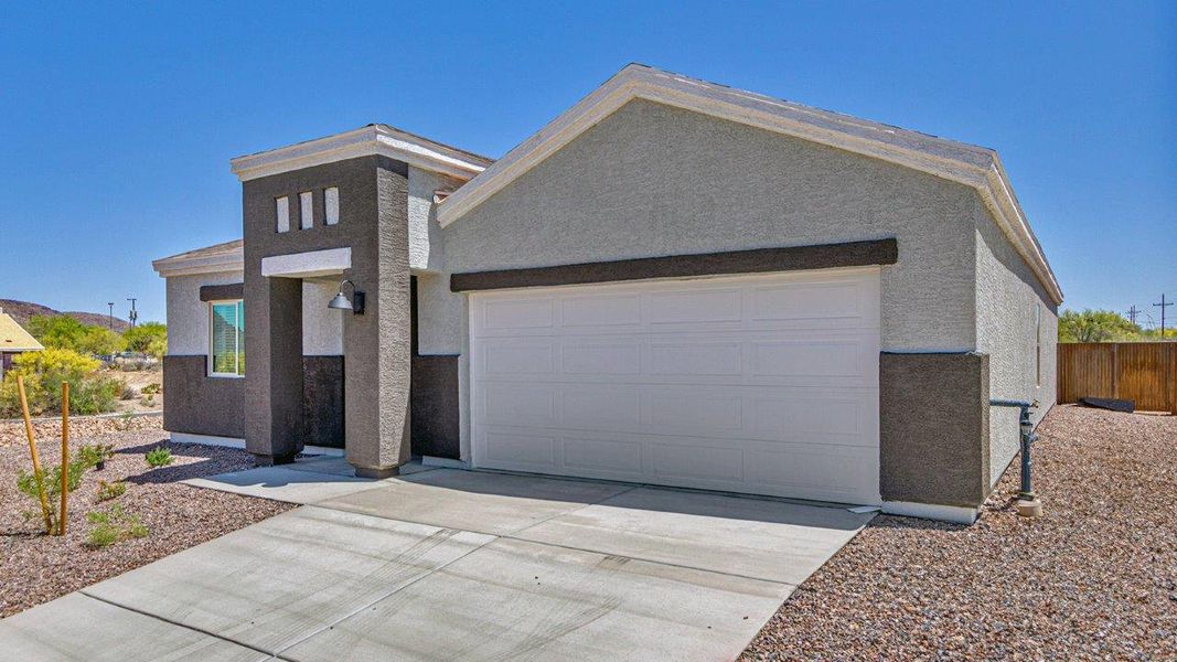 Front exterior of a home in the Roadrunner Estates community, located in Tucson, AZ (Image 4).