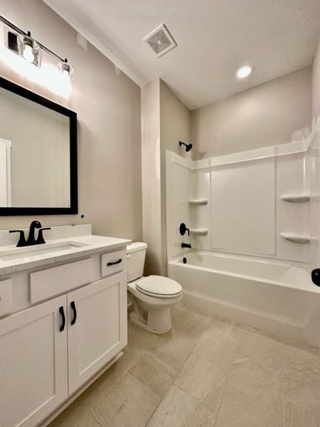 Furnished interior in a model home at Triple Park in Moreland (Image 10).