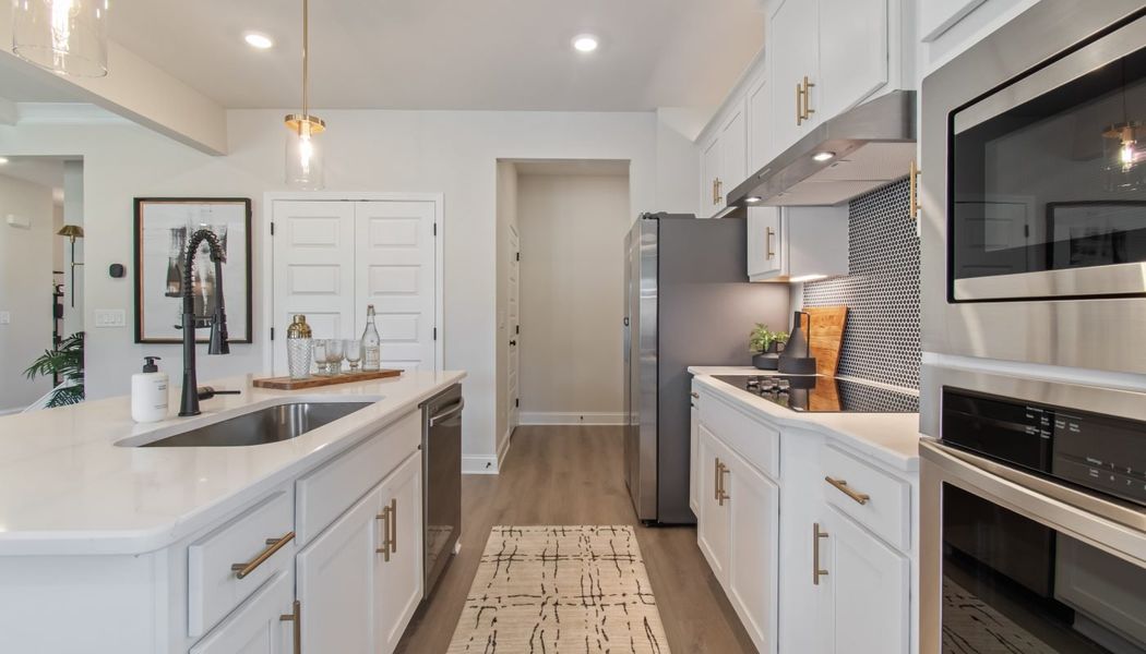 Furnished interior in a model home at Kentmere in Auburn (Image 33).