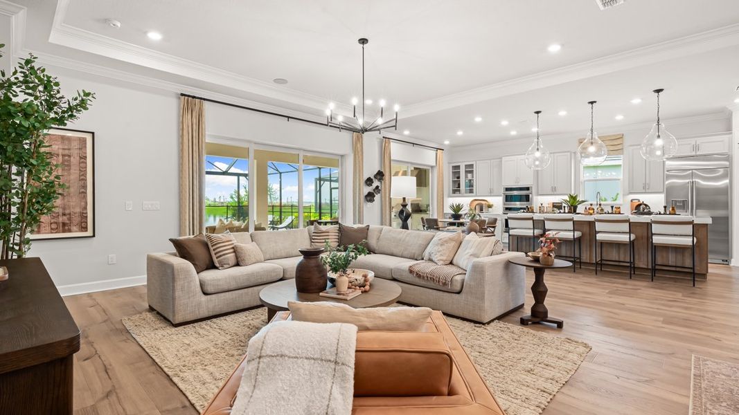Furnished interior in a model home at Esplanade at Kingston in Estero (Image 4).