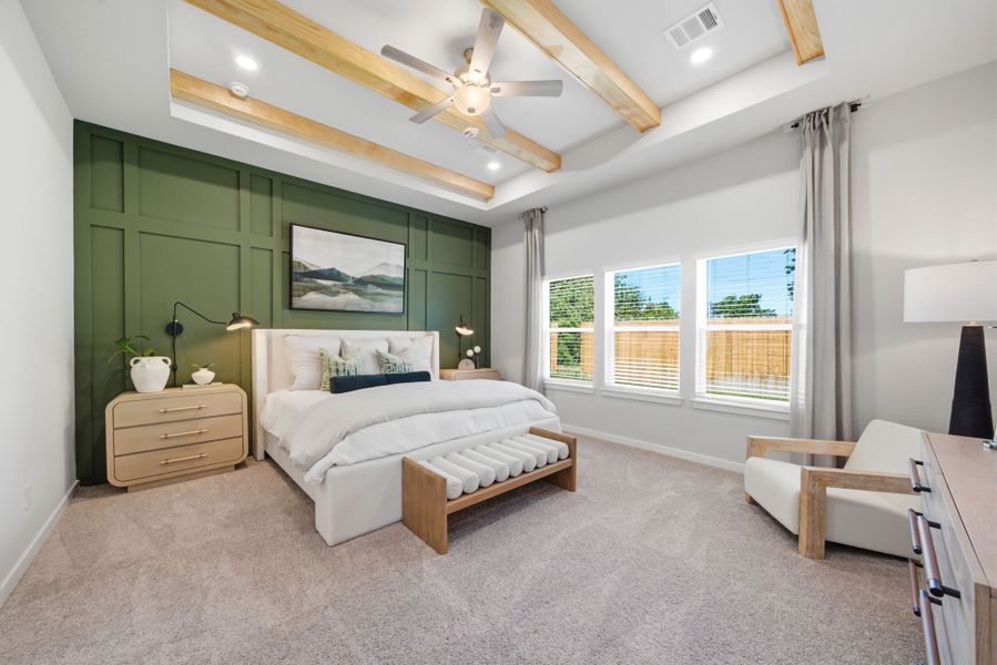 A bedroom with a large bed.