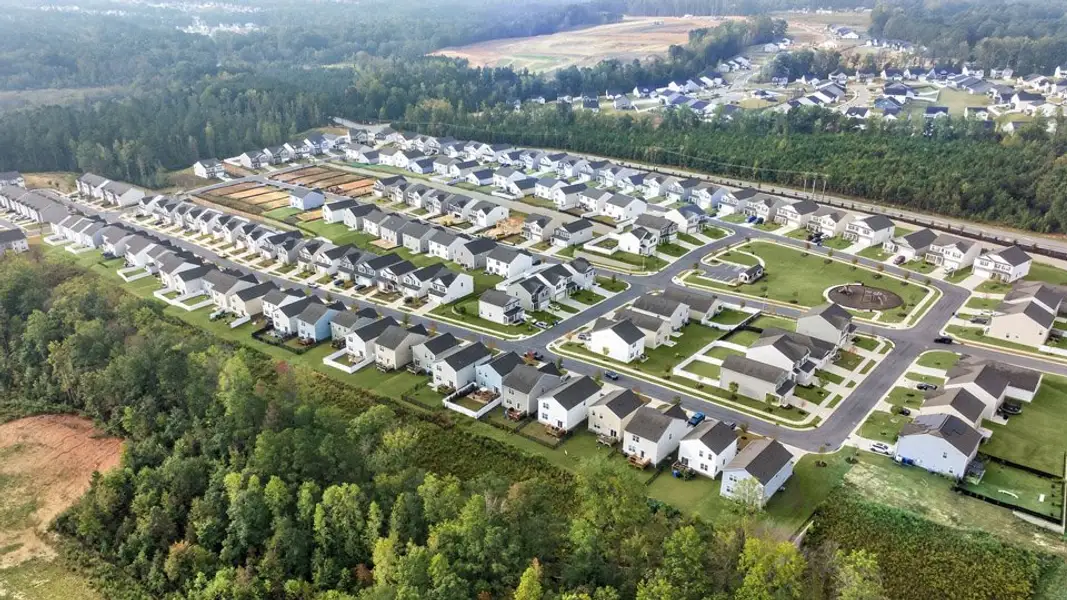 Aerial view of the The Grove at Matthews Landing community in Fuquay Varina, NC, showing layout and nearby surroundings (Image 1).