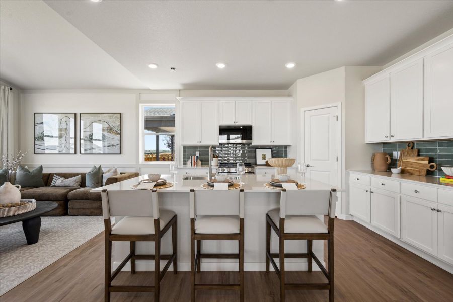 A kitchen with white cabinets. A kitchen with white cabinets.