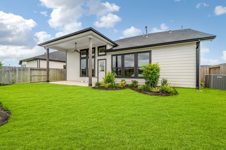 Front exterior of a home in the Mulberry Farms community, located in Santa Fe, TX (Image 11).