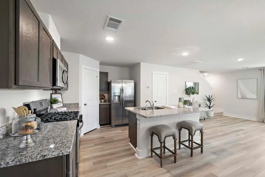 Furnished interior in a model home at Enclave at Cypress in Cypress (Image 13).