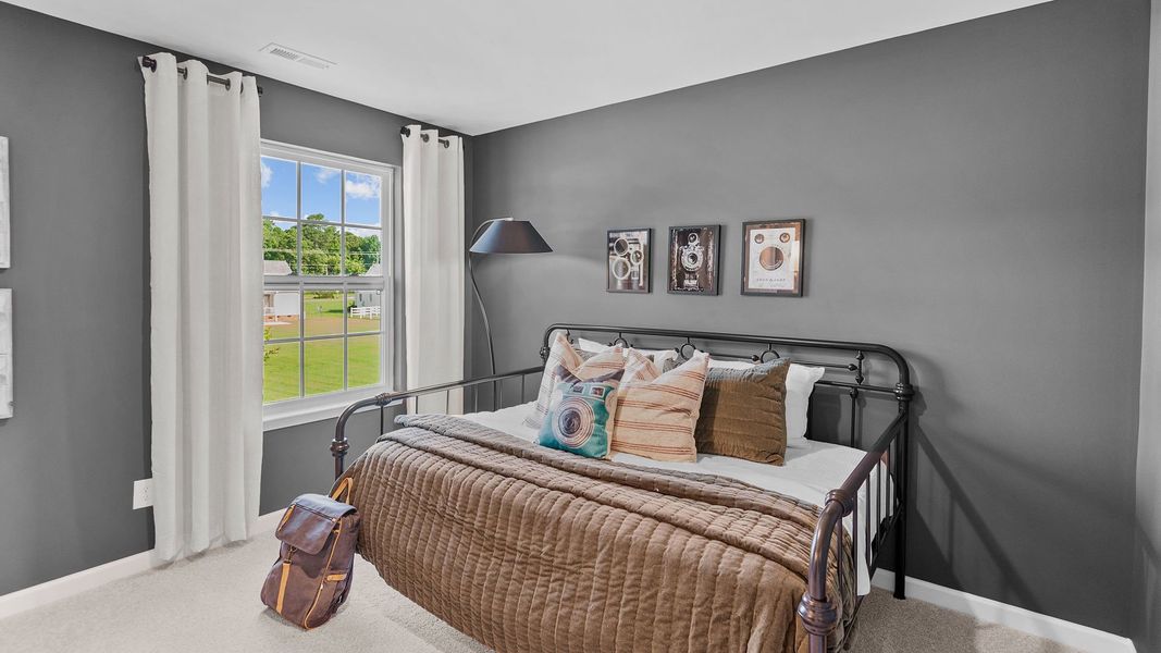 Furnished interior in a model home at The Preserve at Kinsley in Jamestown (Image 19).