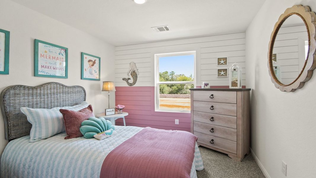 Furnished interior in a model home at Castles Edge in Willis (Image 13).