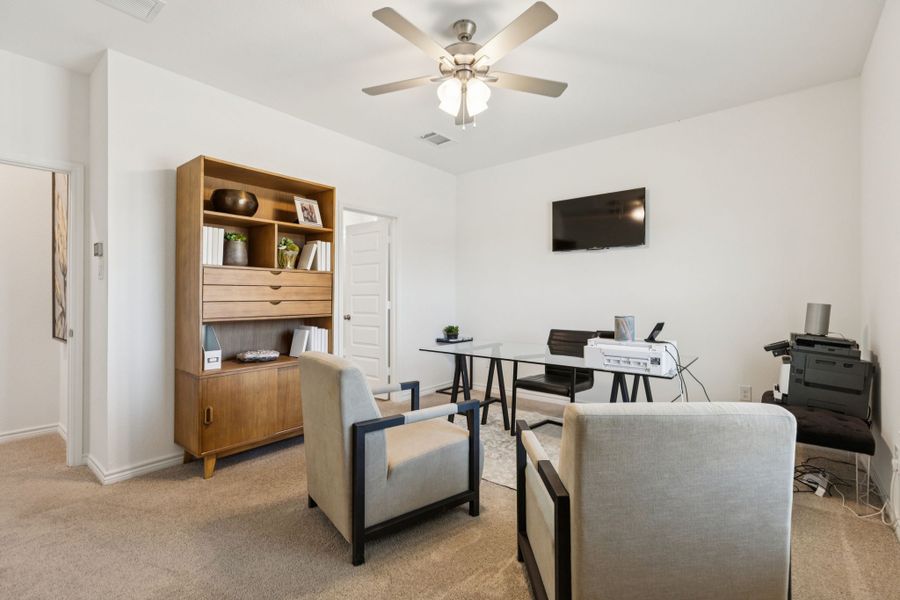 Furnished interior in a model home at Eagle Cove in Denton (Image 20).