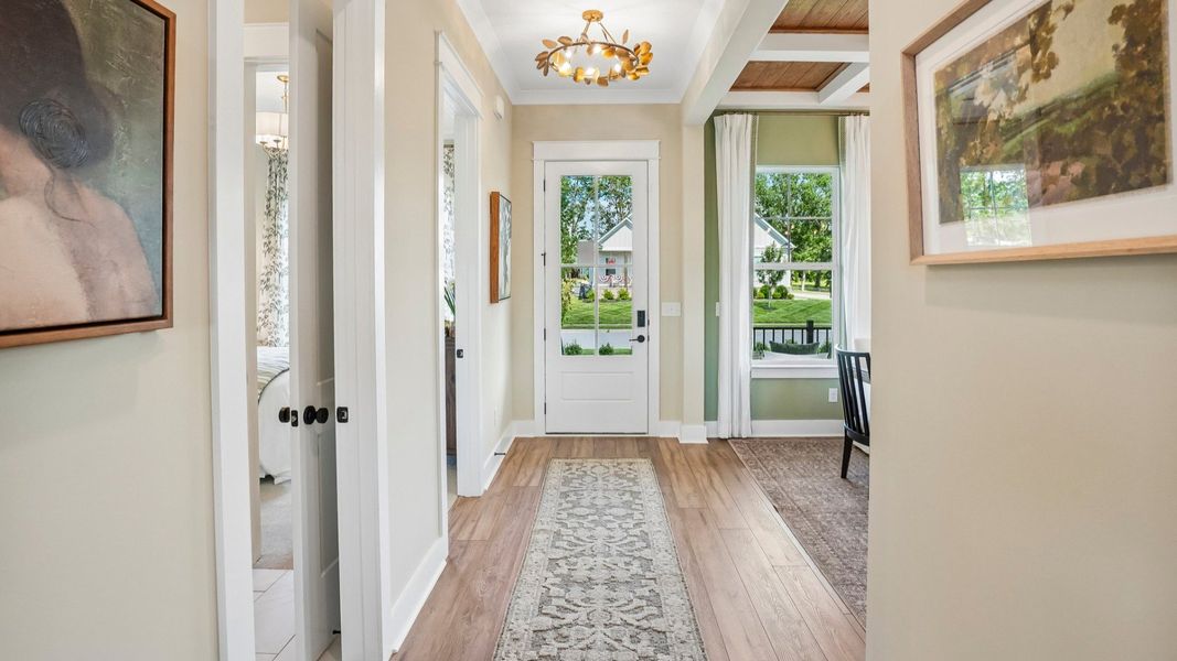 Front entryway to home with access to dedicated dining room Front entryway to home with access to dedicated dining room
