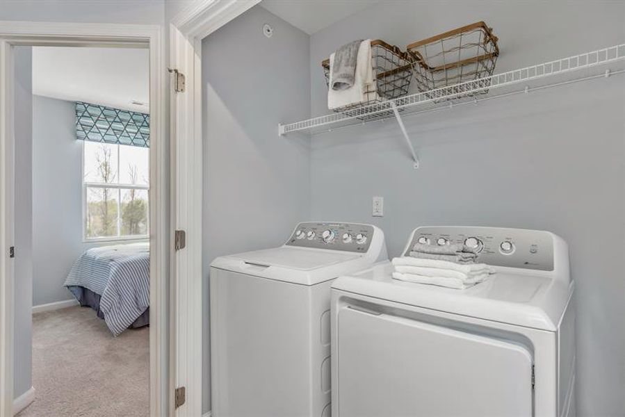 Furnished interior in a model home at South Mills Towns in South Mills (Image 11).