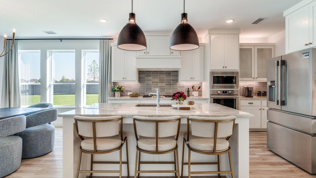 Furnished interior in a model home at Painted Tree - South in McKinney (Image 6).