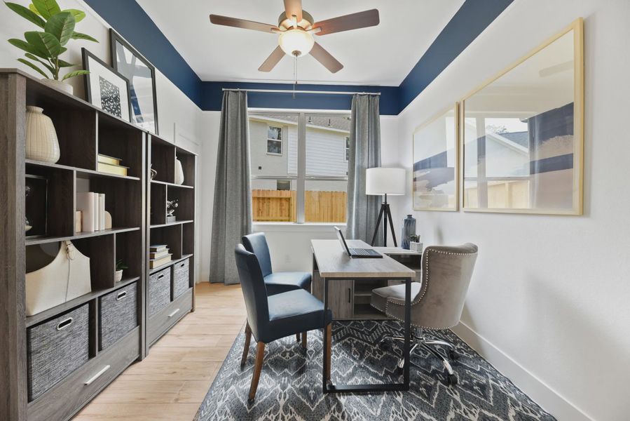 Furnished interior in a model home at Evergreen in Conroe (Image 6).