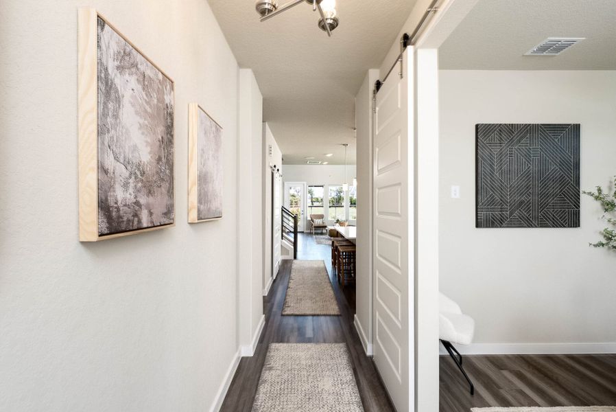 Furnished interior in a model home at August Fields in New Braunfels (Image 30).